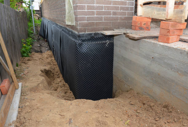 SJ Waterproofing Pros technician performing targeted Exterior Waterproofing assessment in Echola, AL